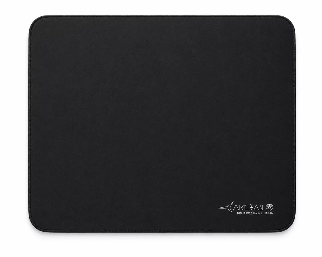 A black rectangular gaming mouse pad with rounded corners, featuring a small white ARTIZAN logo in the bottom right corner, set against a plain white background.